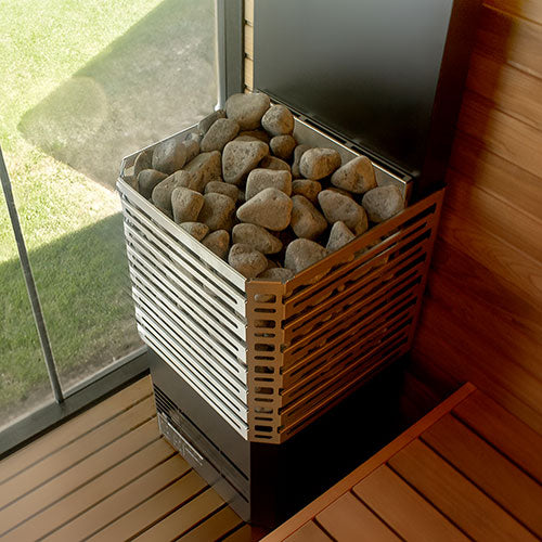 Saunum stainless heater inside glass sauna