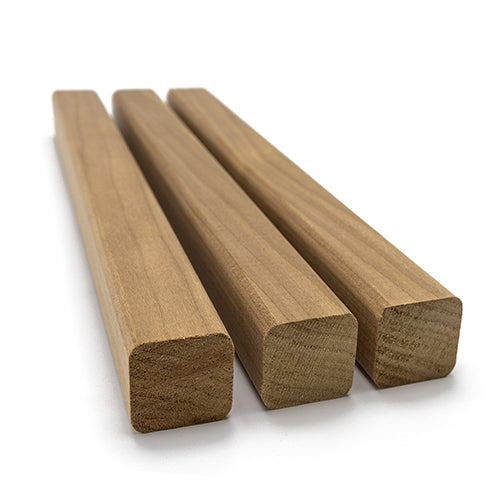 Three pieces of Thermo-Aspen 28mm x 28mm sauna wood.