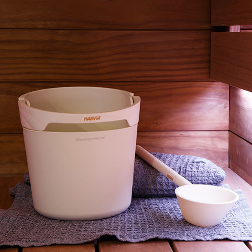 White sauna bucket with wooden handle and scoop