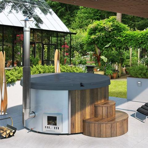 SaunaLife Model S4N wood-burning hot tub outdoors with thermo-spruce exterior and fiberglass interior for six people