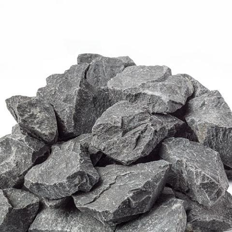 Close-up of Cozy Heat Traditional Olivine Diabase split-face sauna stones for woodburning stoves