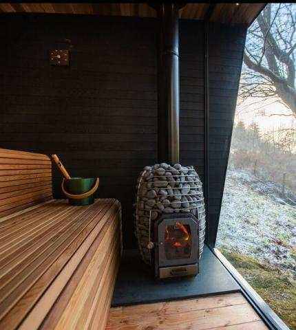 HUUM HIVE Wood 17.0kW wood-fired sauna stove with stainless steel construction and large stone capacity
