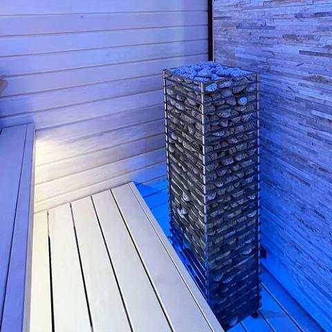 HUUM Cliff sauna heater in room