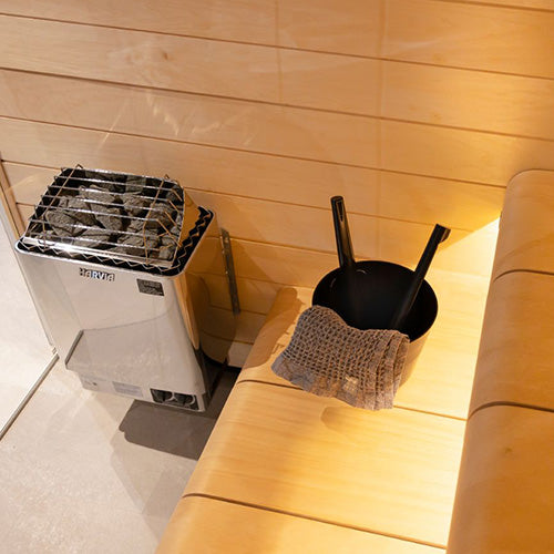 Harvia Click Sauna Bucket & Ladle in a sauna setup