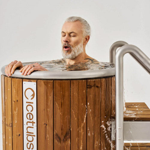 Icetubs IceBarrel immersion tub man enjoying therapy