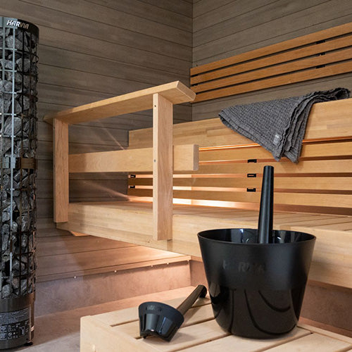Sauna interior with Harvia sauna bucket and ladle set