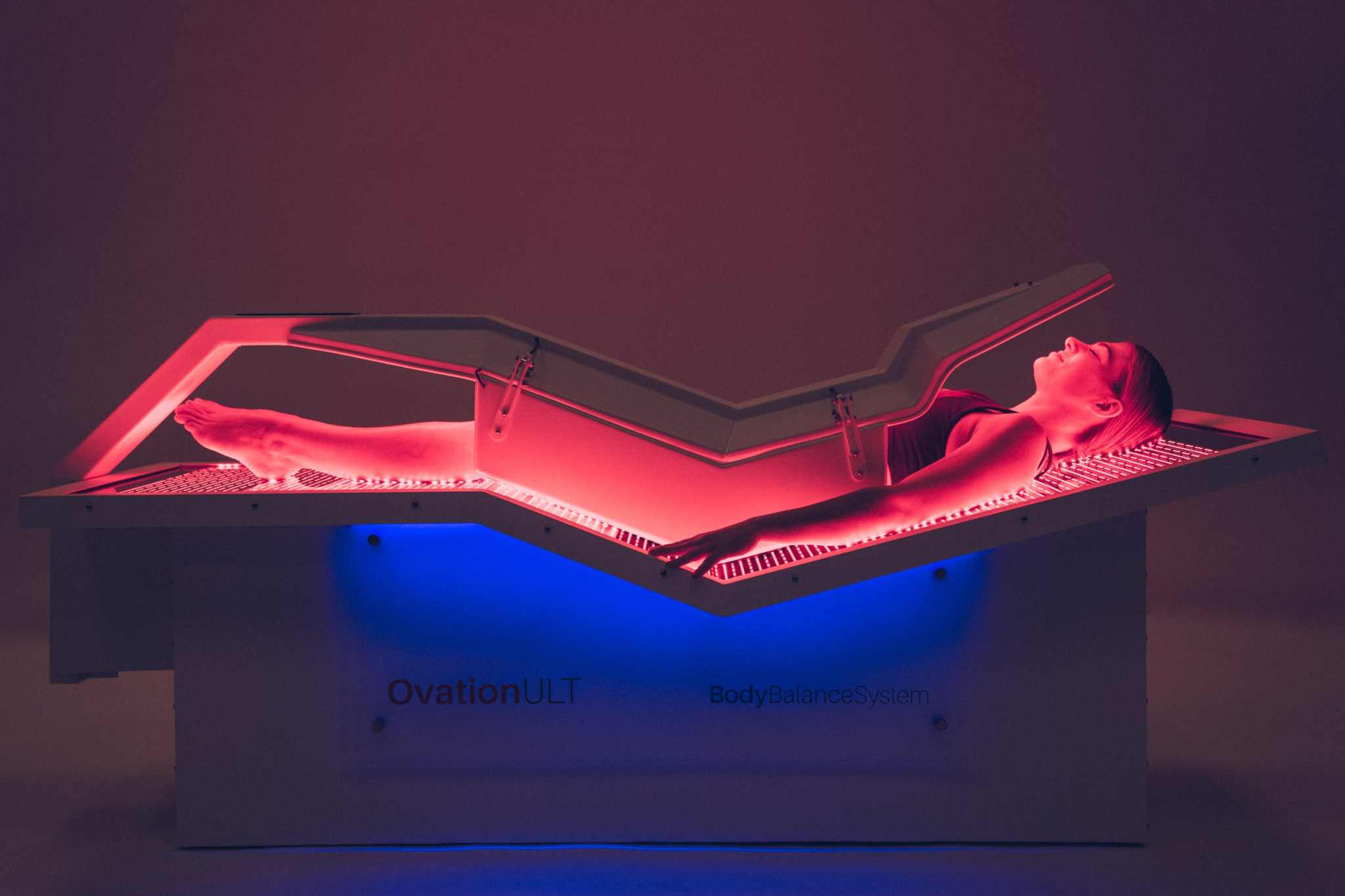 Body Balance Ovation ULT red light therapy bed showing ergonomic design