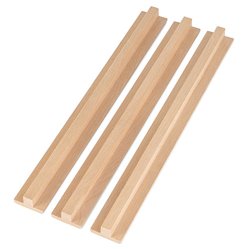 Three parallel Alder sauna T-mouldings